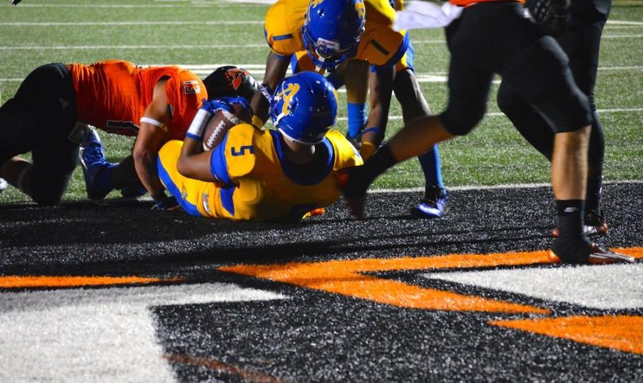 Camargo scores the first touchdown in a 42-6 rout of Aledo High School.