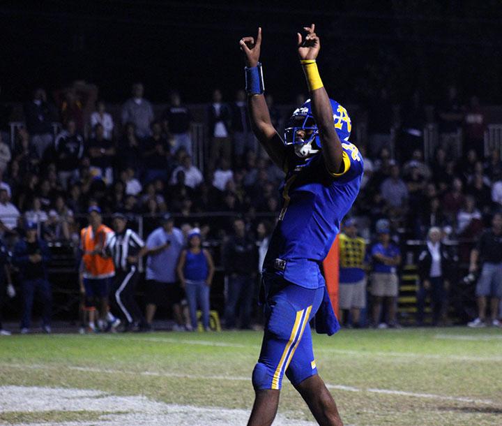 Tyler Vaunghns celebrating his touchdown.