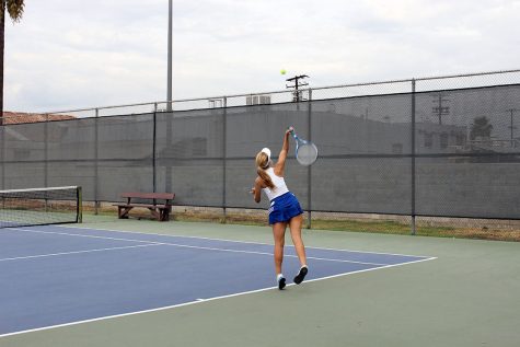 Natalie Lodolo serving in girls singles 