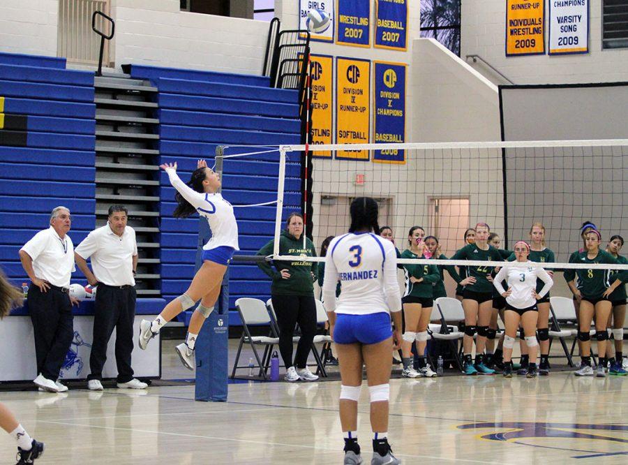 No. 6 Maddy Ledesma gets ready to spike the ball. 