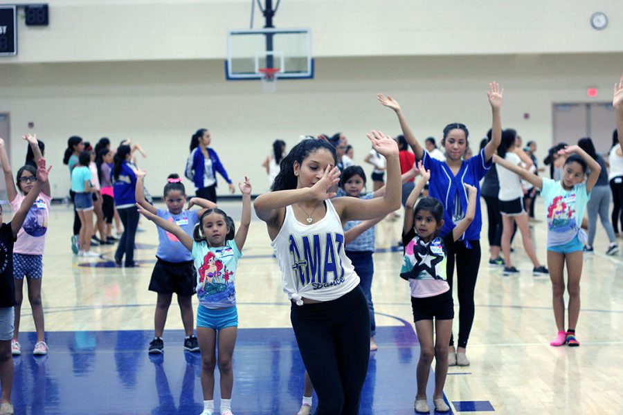 Kaila Reid leading beginning dancers in their routine. 