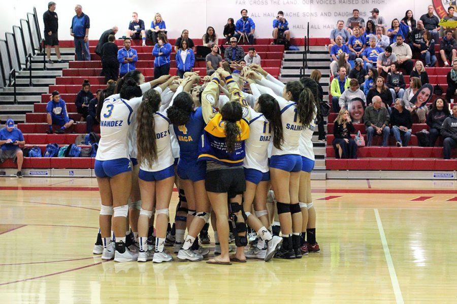 Varsity girls bring it in before the game.