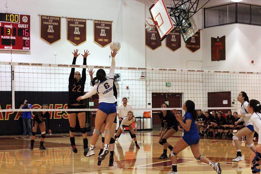 Senior Madison Ledesma goes up for a spike.