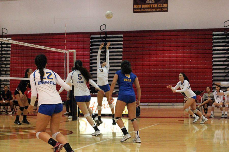 Amat player puts up a perfect set.