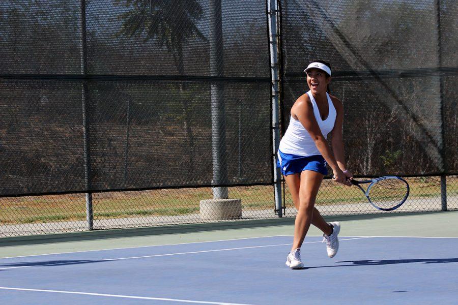 Kalea Fajardo returns a backhand with a smile.