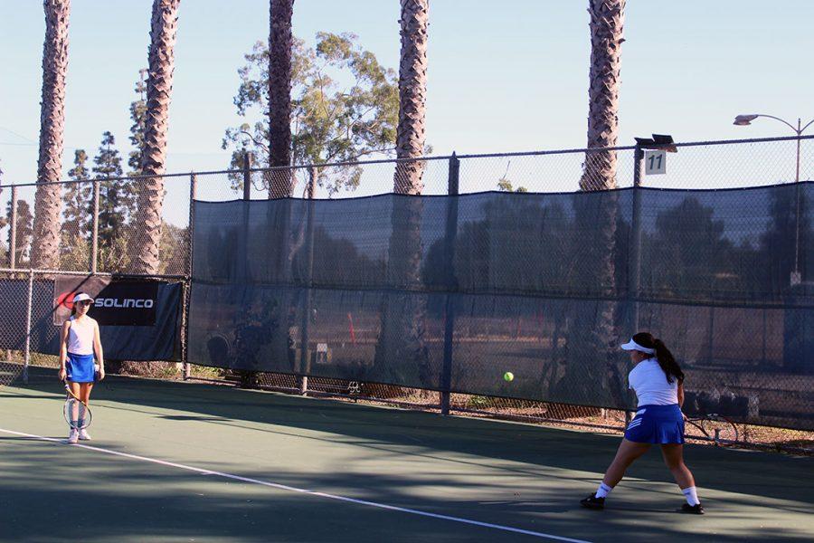 Diana Rodriguez returns the backhand.