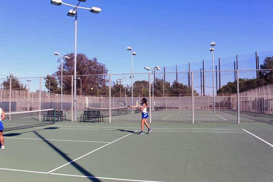 Annaliesse Galaviz returns the forehand. 