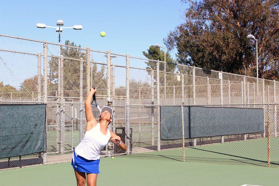 Kalea Fajardo serves the ball.