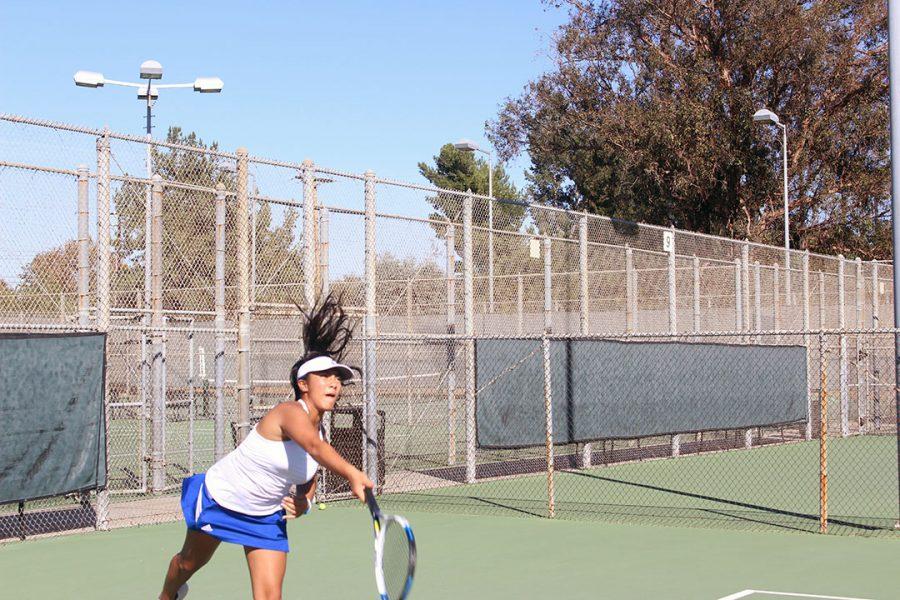 Kalea Fajardo slices the ball.