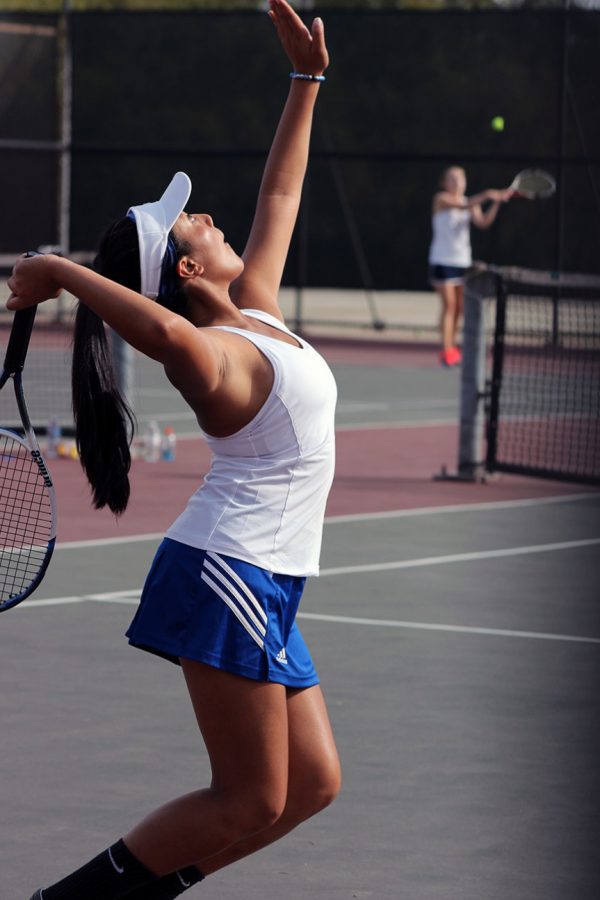 Kalea Fajardo serves the ball.