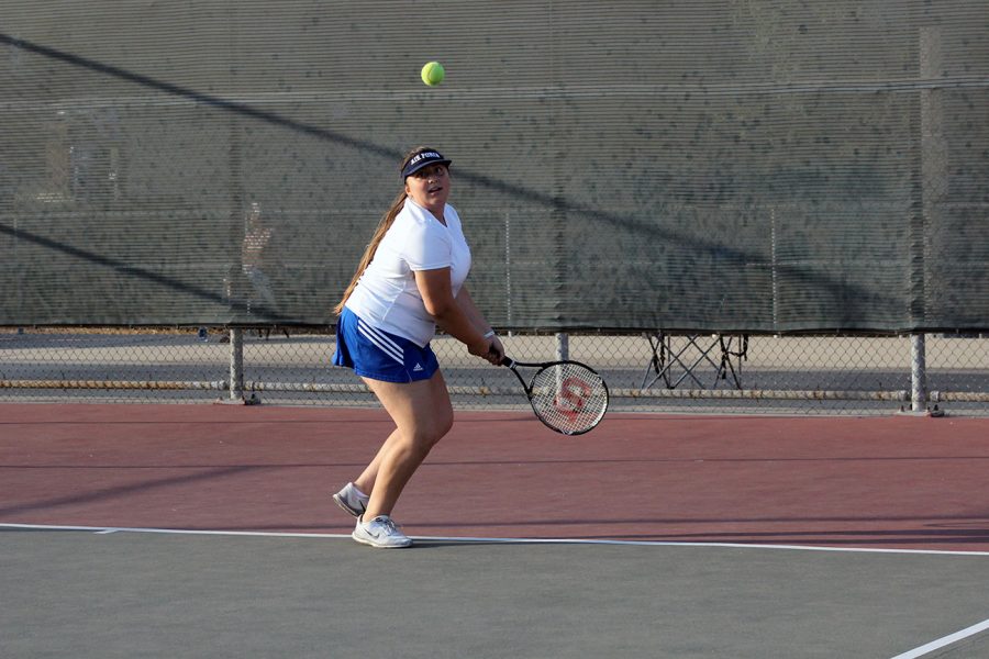 Kristie Jimenez prepares to return the backhand.