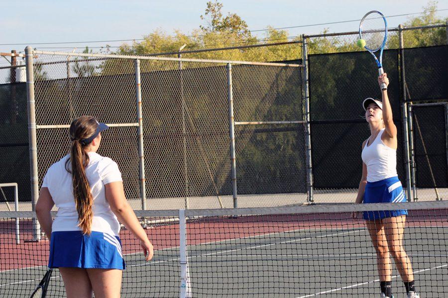 Natalie Lodolo and Kristie Jimenez warm up.