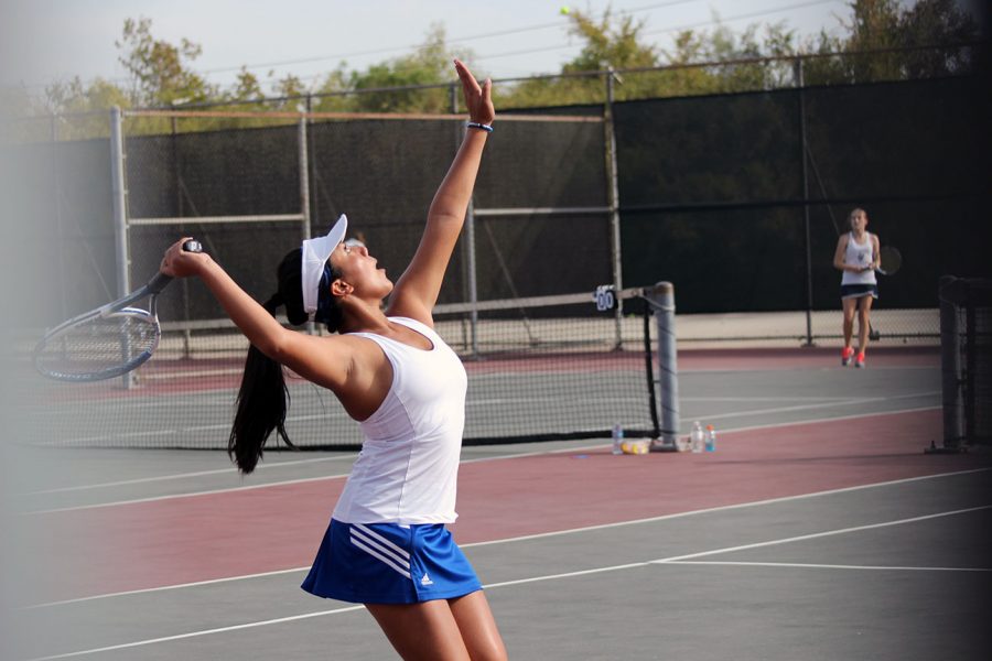 Kalea Fajardo serves the ball. 