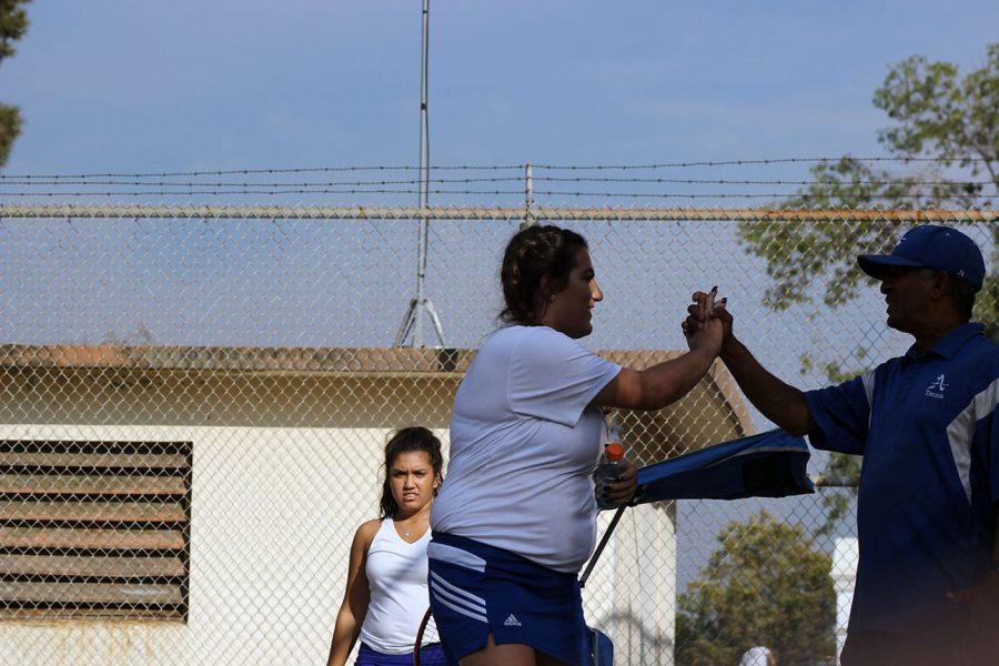 Carina Giancanelli celebrates her victory with Coach AJ