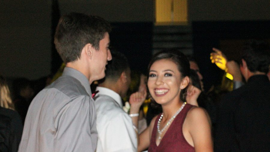 Talpa Galvan dances with her date, Matthew Nugent.