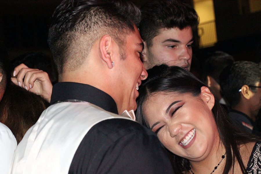 Luke Espinosa and Taylor Noriega enjoy dancing with each other.