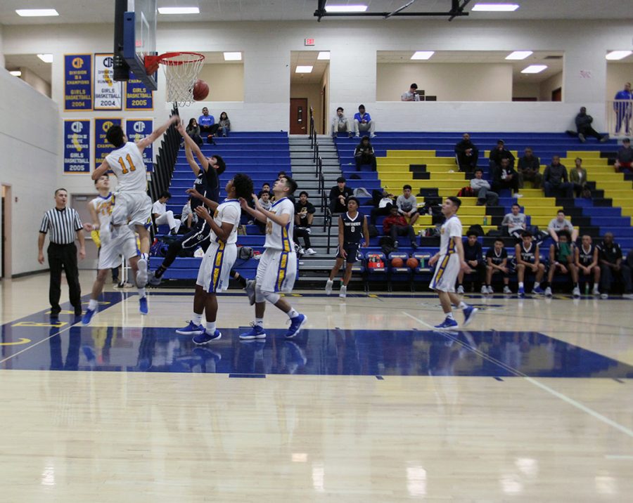 Ismael Arellano blocks a shot. 