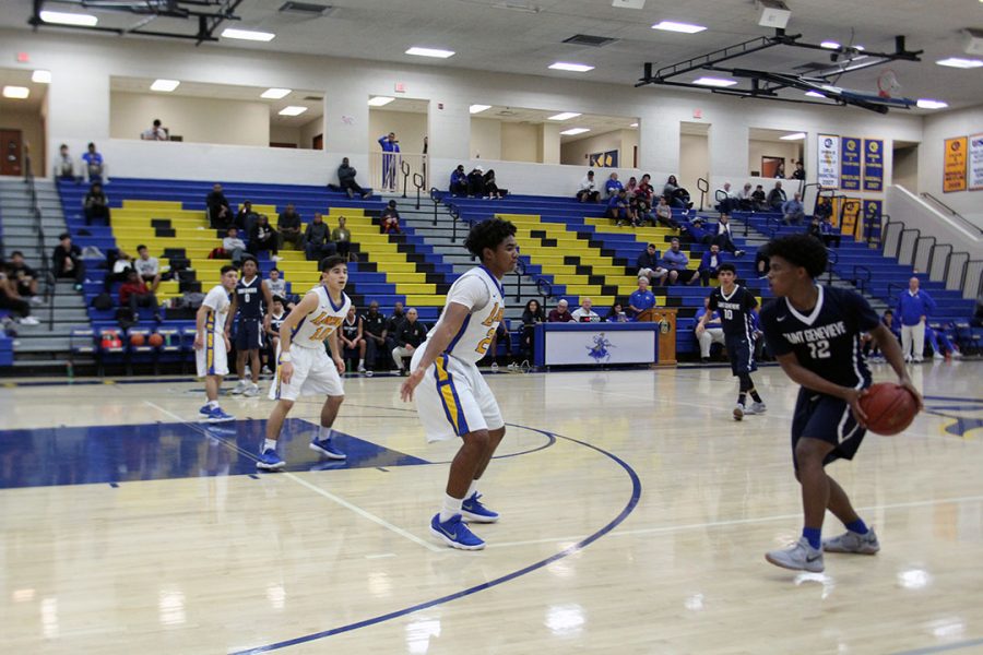 Damian Moore stands his defensive ground.