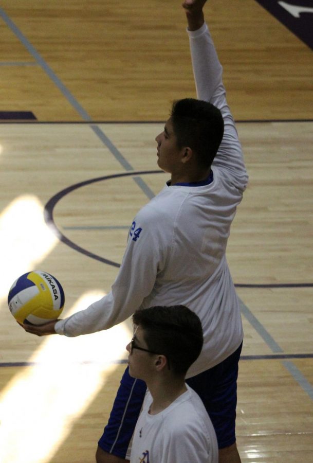 Nick Sanchez attempts his pregame serve.