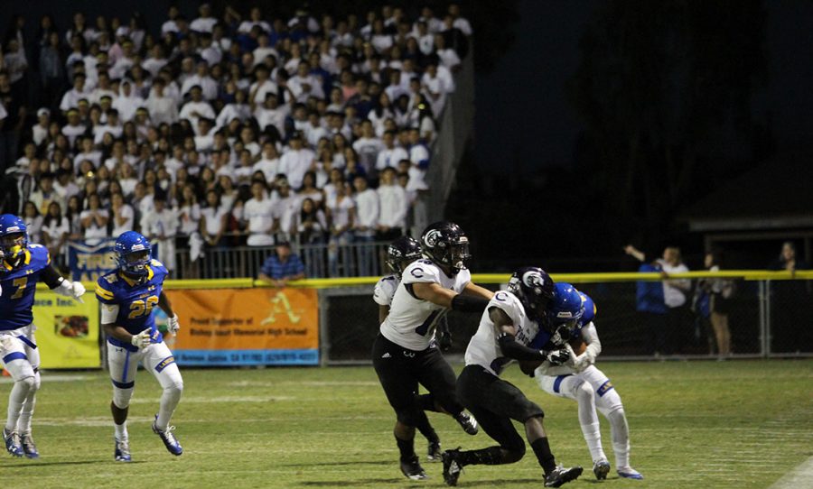 Amat player runs with the ball.