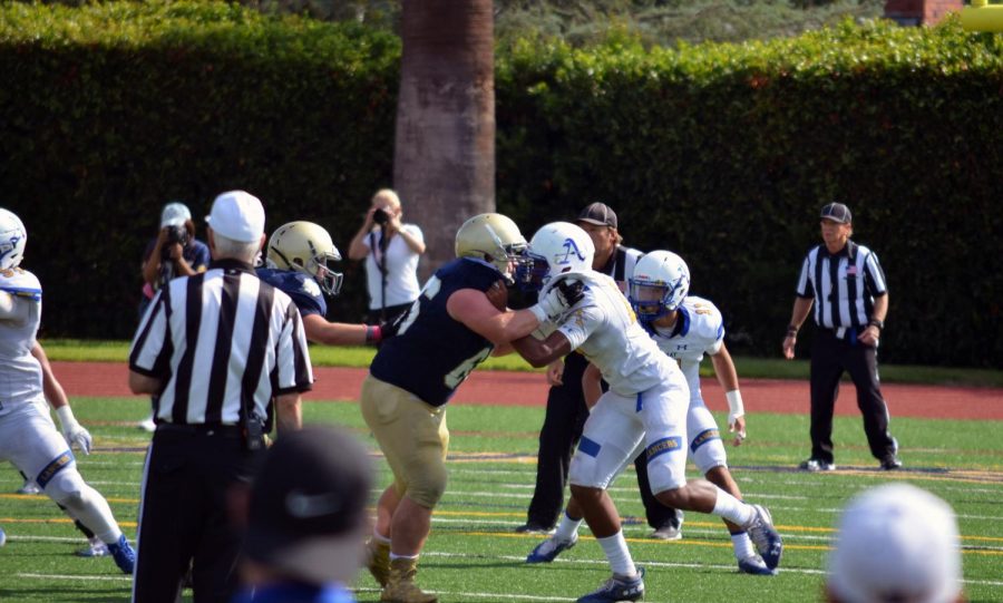 Elijah Ponder blocks for the Lancers