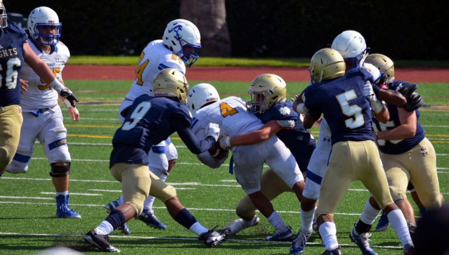 Kenny Collins tackled by Notre Dame Knights