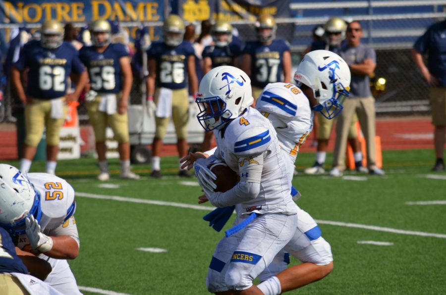 Kenny Collins carries the ball