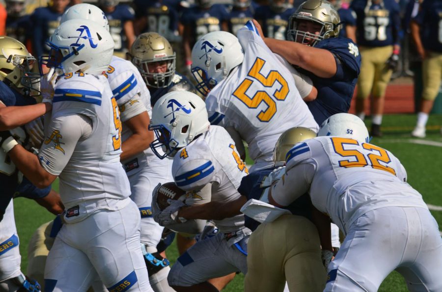 Kenny Collins running with the ball