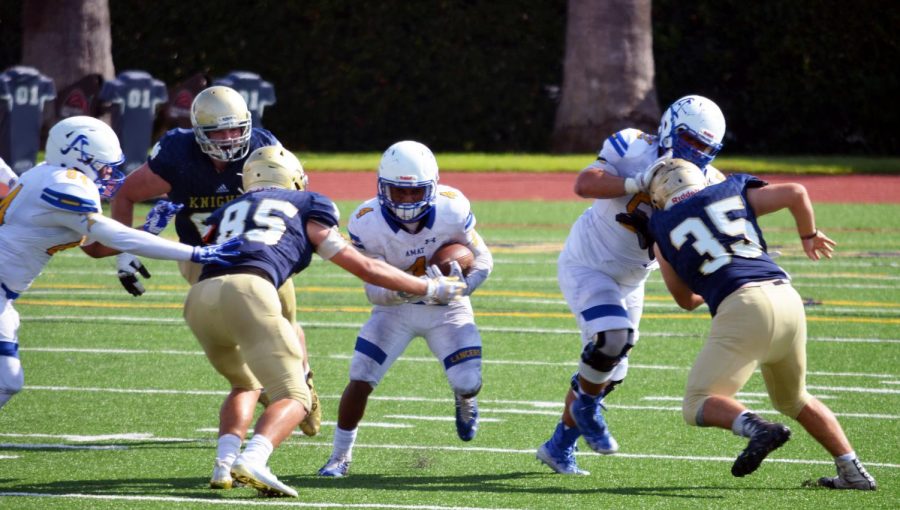 Kenny Collins carries the ball