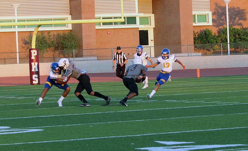 S Micah Hidalgo ready to make the tackle.