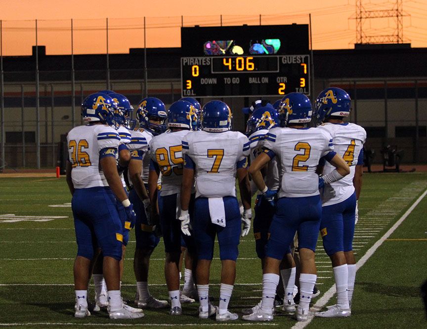 Defense huddles up for a timeout.