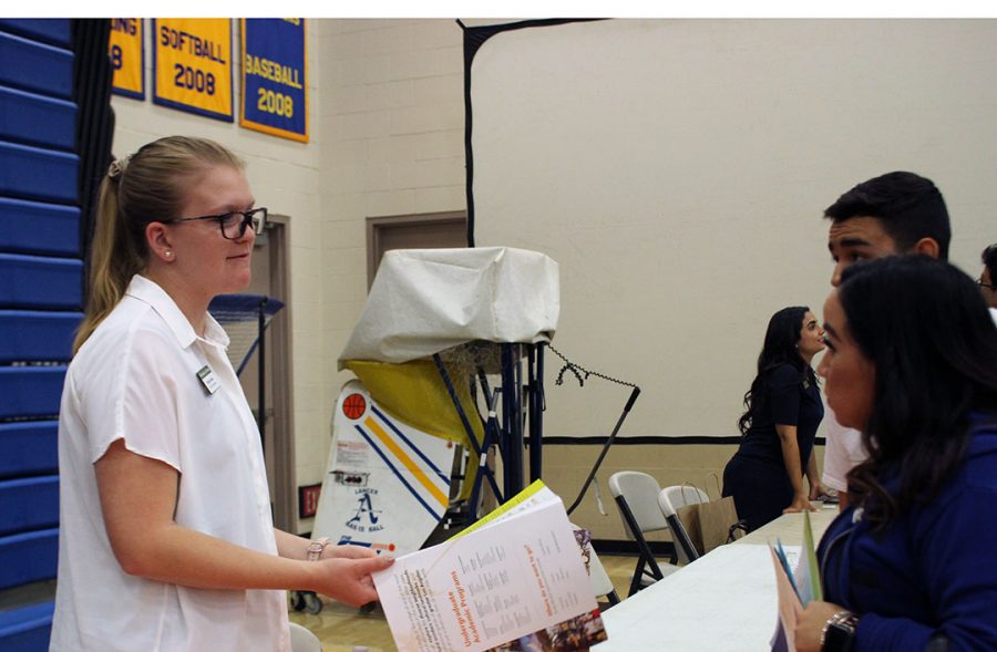 La Verne representative informing student.