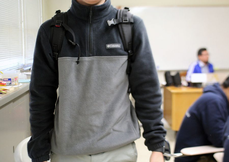 Unidentified male student wears an illegal Columbia sweater. 