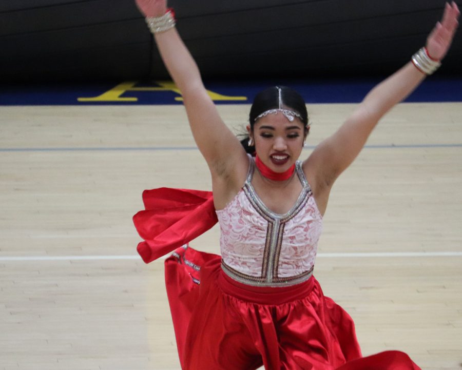 Krisa Uso is showing some of her dance moves. 