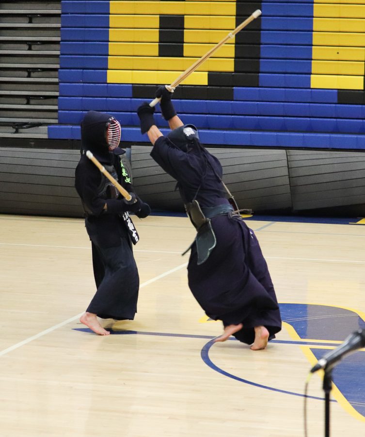 Two students part of the Kendo boys put on a demonstration at the mini-rally.