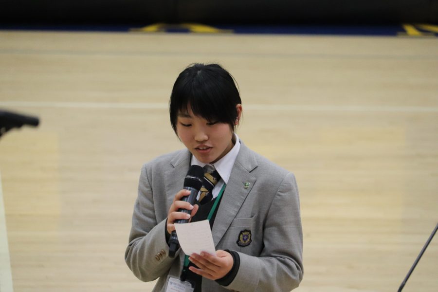 An Oki Gakuen student thanks Bishop Amat for hosting them. 