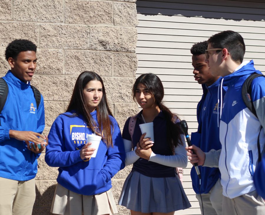 A group of Bishop Amat students are giving their opinion about the new lemon cookies. 