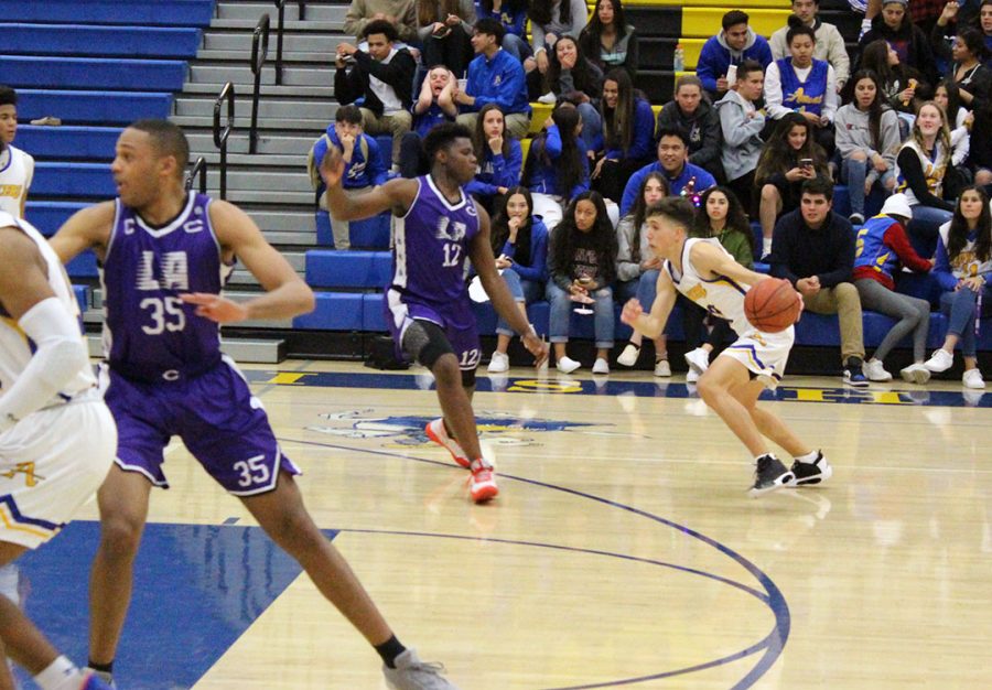 Newton Acevedo drives to the basket