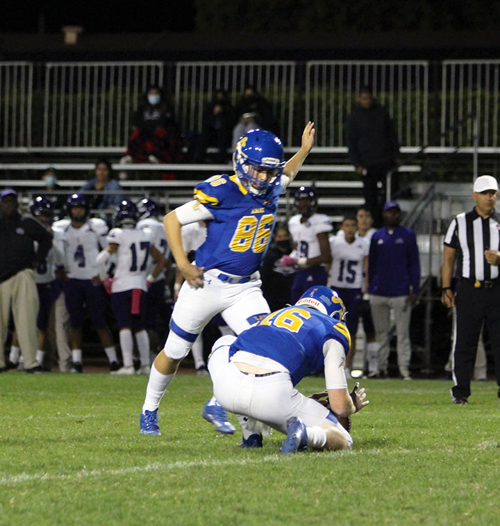Bishop Amat Football player 86 kicking ball on Friday at the kefir stadium for points