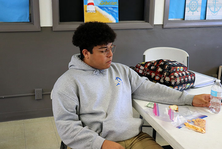 Jaden Dukes having his lunch in Mr.Vowels classroom without a mask. 