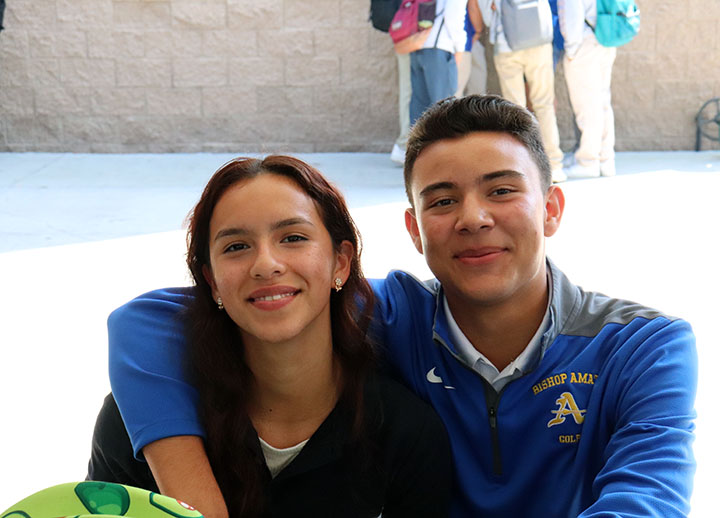 Isabel Zaragoza and Anthony Ilustre are hanging out together during lunch. 