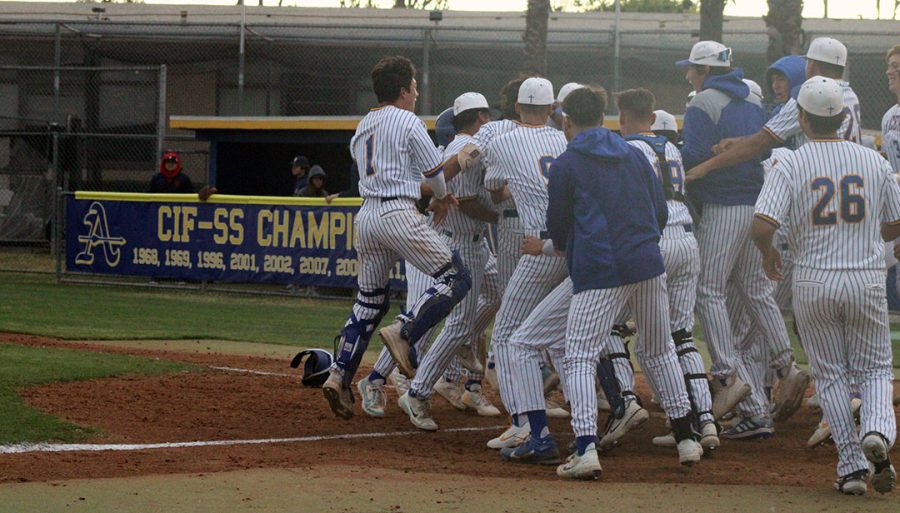 Lancers celebrating their first league win.