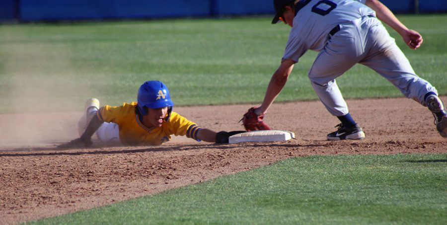Frankie Peralez sliding safe into second base.