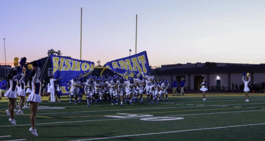 The Lancers run out onto the field before thrashing Damien.