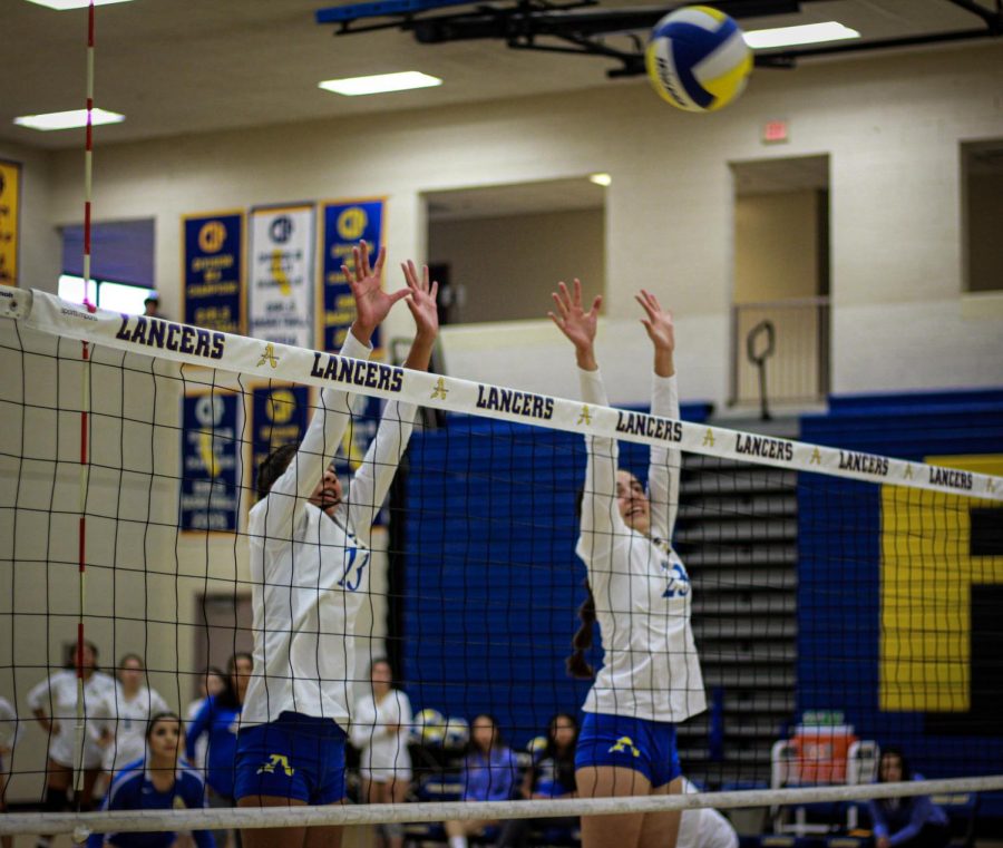 Jessica Estrada attempting to block the ball. 