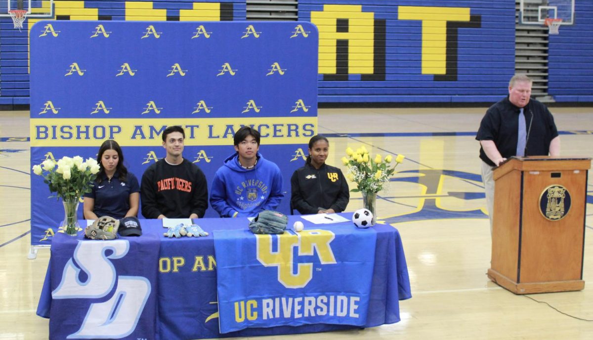 Four+seniors+preparing+to+officially+sign+to+their+committed+colleges.