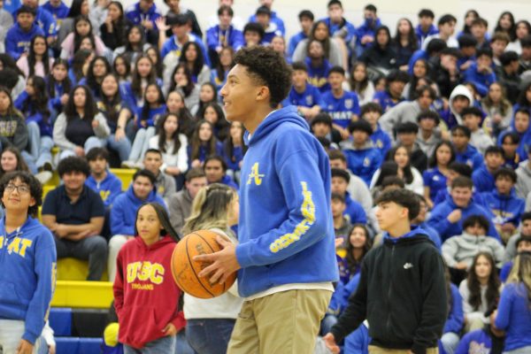 Students hoop it up with teachers at the winter rally